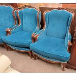 PAIR OF 20TH CENTURY CONTINENTAL MAHOGANY FRAMED WINGBACK ARMCHAIRS ON CABRIOLE SUPPORTS