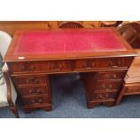 20TH CENTURY MAHOGANY TWIN PEDESTAL DESK WITH LEATHER INSET TOP & 2 FRIEZE DRAWERS OVER 2 STACKS OF