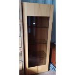 OAK DISPLAY CABINET WITH 2 GLAZED PANEL DOORS OPENING TO SHELVED INTERIOR.