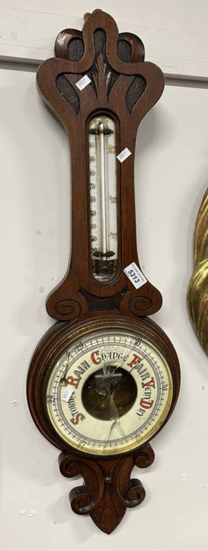 EARLY 20TH CENTURY OAK CASED ANEROID BAROMETER WITH CARED DECORATION