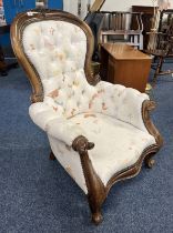 19TH CENTURY MAHOGANY FRAMED BUTTONED BACK GENTLEMANS ARMCHAIR ON CABRIOLE SUPPORTS
