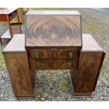 MAHOGANY BUREAU WITH CENTRALLY SET FALL FRONT OVER 2 DRAWERS FLANKED ON EACH SIDE BY TWINED