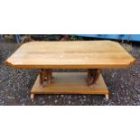 EASTERN HARDWOOD COFFEE TABLE ON TWIN CARVED ELEPHANT SUPPORTS ON RECTANGULAR BASE .