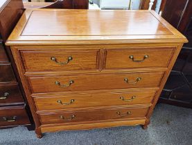 HARDWOOD CHEST OF 2 SHORT OVER 3 LONG DRAWERS ON SHAPED SUPPORTS,
