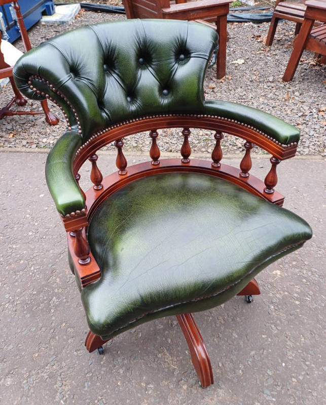 20TH CENTURY MAHOGANY FRAMED BUTTONED GREEN LEATHER SWIVEL OFFICE CHAIR Condition Report: