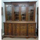EARLY 20TH CENTURY MAHOGANY BREAKFRONT BOOKCASE WITH 4 ASTRAGAL GLASS DOORS OVER 3 DRAWERS WITH 4