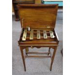 20TH CENTURY MAHOGANY CASED BRASS GLOCKENSPIEL DINNER GONG WITH SPLAYED SUPPORTS.