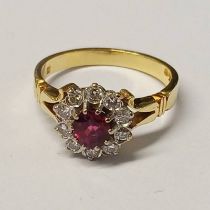 18CT GOLD RUBY & DIAMOND CLUSTER RING,