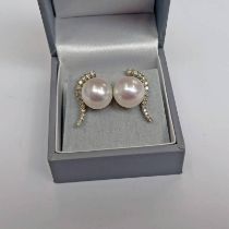 PAIR OF 14K GOLD CULTURED PEARL & DIAMOND SET EARRINGS, THE PEARLS APPROX 11 MM,