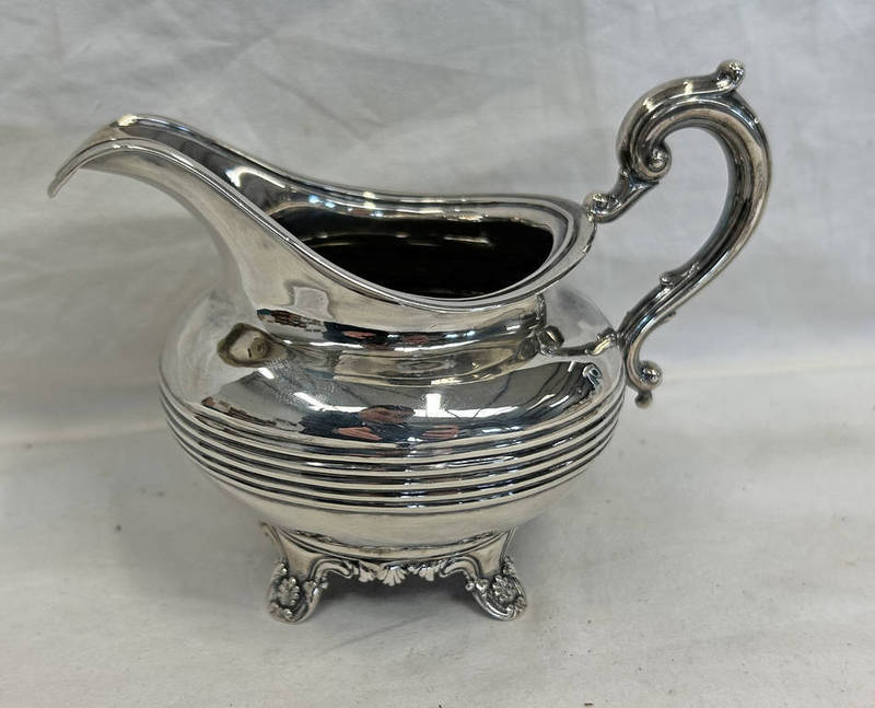 VICTORIAN SILVER CREAM JUG WITH RIBBED DECORATION ON 4 SHAPED SUPPORTS BY A & J SAVORY,