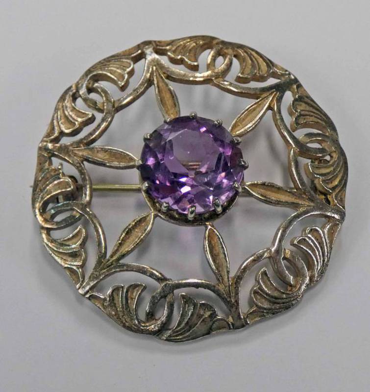 IONA SILVER AMETHYST SET CIRCULAR BROOCH WITH PIERCED DECORATION BY JOHN HART,