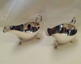 PAIR SILVER SAUCE BOATS ON 3 SUPPORTS,