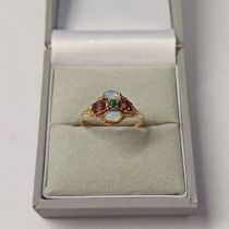 12CT GOLD SUFFRAGETTE CLUSTER RING SET WITH GARNETS,