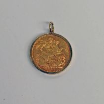 1903 PERTH MINT SOVEREIGN IN A 9CT GOLD PENDANT - 9.