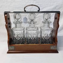 OAK 3-DECANTER TANTALUS WITH SILVER PLATED MOUNTS Condition Report: Marked PB & S to