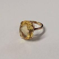 9CT GOLD OVAL CITRINE SET RING - 6.0G, RING SIZE N Condition Report: Stone: 18.