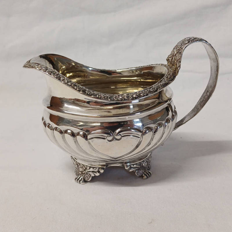 GEORGE III SILVER CREAM JUG ON 4 SCROLL SUPPORTS BY WILLIAM HUNTER,