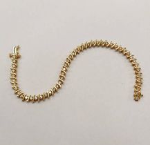 14K GOLD DIAMOND SET WAVY LINK BRACELET, THE ROUND BRILLIANT CUT DIAMONDS VERY APPROX 4.