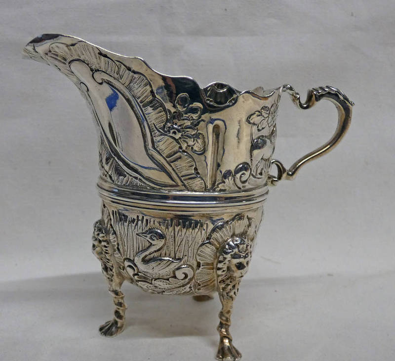 VICTORIAN SILVER CREAM JUG EMBOSSED WITH BIRDS, FOXES, ETC WITH LIONS MASK DECORATION ON PAW FEET,