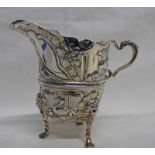 VICTORIAN SILVER CREAM JUG EMBOSSED WITH BIRDS, FOXES, ETC WITH LIONS MASK DECORATION ON PAW FEET,