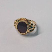 19TH CENTURY GOLD CARNELIAN SET SIGNET RING WITH DECORATIVE MOUNT - RING SIZE T, 7.