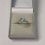 9CT GOLD AQUAMARINE 3 - STONE RING WITH DIAMOND SET SHOULDER - RING SIZE: P Condition
