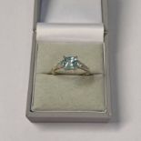 9CT GOLD AQUAMARINE 3 - STONE RING WITH DIAMOND SET SHOULDER - RING SIZE: P