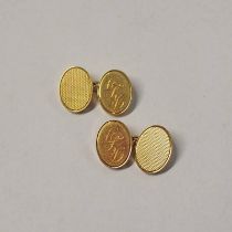 PAIR OF 18CT GOLD OVAL CUFFLINKS - 26.