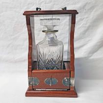 SILVER MOUNTED MAHOGANY TANTALUS WITH SILVER MOUNTED SQUARE GLASS DECANTER