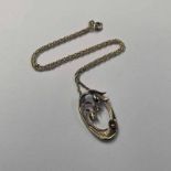 9CT GOLD SCOTTISH GOLD CITRINE SET PENDANT ON A 9CT GOLD CHAIN BY OLA GORIE - 8.