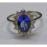 18 CT GOLD TANZANITE & DIAMOND CLUSTER RING,