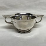 SILVER 2-HANDLED PEDESTAL NUT DISH BY WAKELEY & WHEELER,