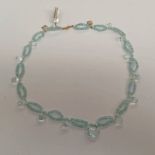 AQUAMARINE NECKLACE ON A 10K GOLD CLASP BY COLEMAN DOUGLAS PEARLS - 42 CM LONG Condition