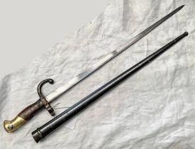 FRENCH GRAS BAYONET WITH 52CM LONG BLADE DATE 1879 TO SPINE OF BLADE WITH ITS STEEL SCABBARD