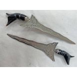 PAIR OF MALAYSIAN KRIS WITH DECORATIVE WHITE METAL BLADES WITH BIRD AND SCROLLING FOLIAGE