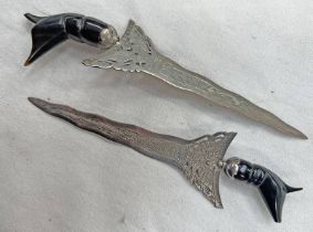 PAIR OF MALAYSIAN KRIS WITH DECORATIVE WHITE METAL BLADES WITH BIRD AND SCROLLING FOLIAGE