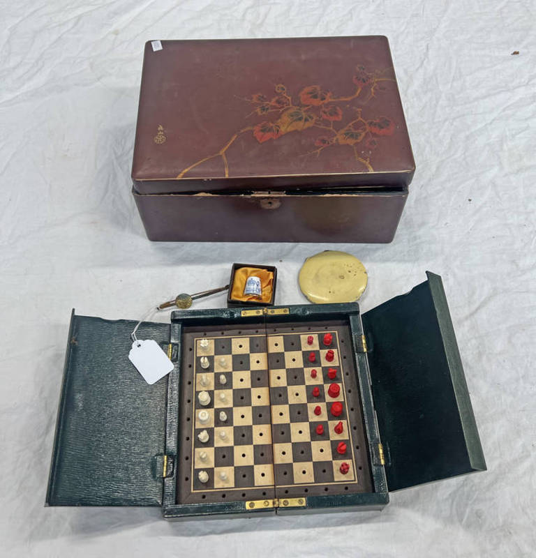 LEATHER CASED CHESS BOARD WITH SOME PIECES,