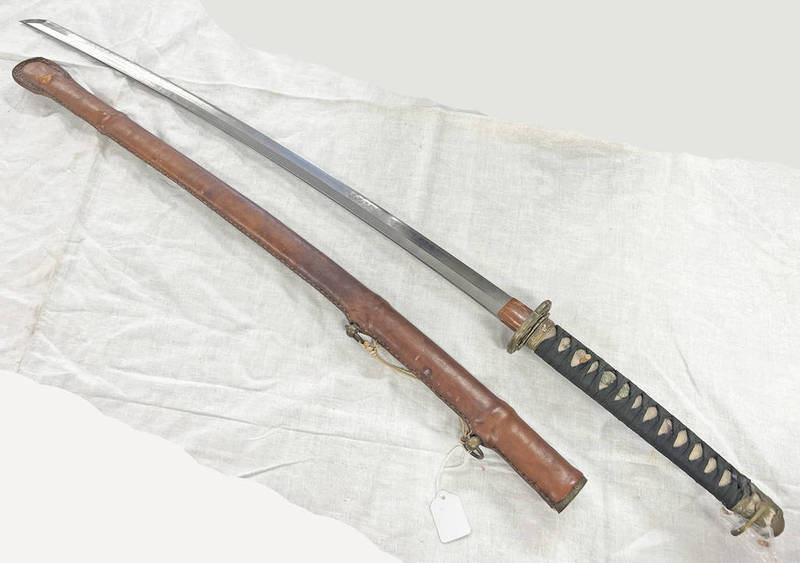 A JAPANESE MILITARY STYLE SWORD WITH 75.