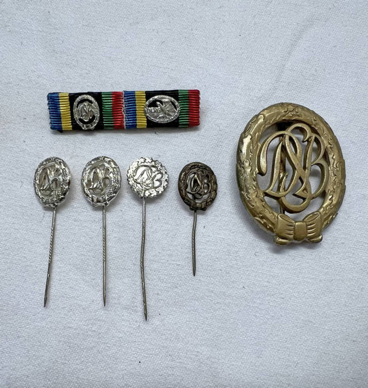 POST 1957 GERMAN BRONZE SPORTS BADGE & 4 STICKPINS & MEDAL BAR