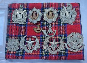 SELECTION OF CAP BADGES TO INCLUDE THE ROYAL SCOTS, SCOTTISH KINGS OWN BORDERERS,