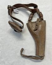 BRITISH 1914 PATTERN REVOLVER HOLSTER (MODIFIED) ON A LEATHER BELT WITH BRASS BUCKLE AND A LEATHER