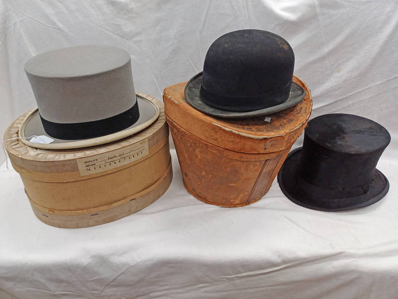 BLACK TOP HAT IN A LEATHER TOP HAT CASE,