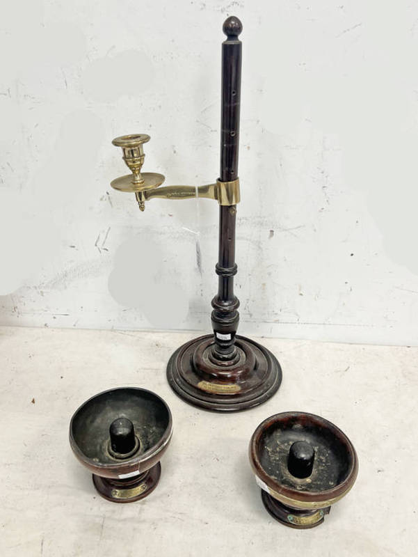 CANDLE STICK HOLDER AND TWO CUPS MADE FROM THE TIMBER TAKEN FROM HMS BRITANNIA WITH BRASS PLAQUES