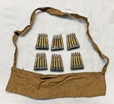 6 CLIPS CONTAINING 5 INERT 303 ROUNDS WITH A CLOTH BANDOLIER