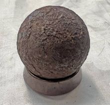 CANNON BALL ON CIRCULAR STAND,