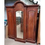 19TH CENTURY MAHOGANY TRIPLE DOOR WARDROBE WITH CENTRALLY SET MIRROR DOOR FLANKED TO EACH SIDE BY