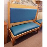 OAK BENCH WITH PADDED BACK & SEAT ON SQUARE SUPPORTS.