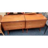 PAIR OF MID 20TH CENTURY TEAK 2 DRAWER CHESTS ON TAPERED SUPPORTS 71 CM TALL X 76 CM LONG