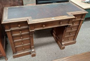 LATE 19TH CENTURY OAK TWIN PEDESTAL DESK WITH LEATHER INSET TOP & 3 FRIEZE DRAWERS OVER 2 STACKS OF