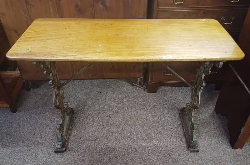 19TH CENTURY MAHOGANY RECTANGULAR TABLE ON LATER DECORATIVE CAST METAL SUPPORTS.